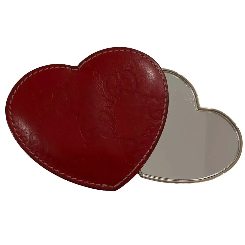 929. Gucci Heart Mirror with Sleeve